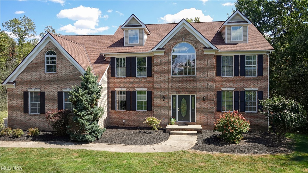 Beautiful estate home on 5 acres of land. This brick colonial features 5 bedrooms, 5 bathrooms, a three-car garage, walk out basement with a in law suit. Step inside the grand foyer and see vaulted ceilings, a beautiful chandelier and a gorgeous black and white stairway. Notice the large office and grand formal living and dining rooms. The spacious kitchen offers cherry cabinets and granite cooktops and large working and sitting island. The eat in kitchen also offers double ovens, pantry and deck access for outside entertaining. The beautiful grand living room has a feature wall complete with large picture windows overlooking the wooded back yard. There is a second stairway to the 2nd floor with landing overlooking the great room. The master suite offers a sitting room and updated master bathroom with granite counter tops walk-in shower and soaking tub. Four more spacious bedrooms share the other 2 full upstairs bathrooms.
The walk out basement has a movie room with chairs from a real theater as well as a full in law suite complete with kitchenet, full bathroom, bedroom and massive recreation room.
the 5 acre lot includes a large deck, lower level brick patio with hot tub and fire pit.
This amazing estate home is priced to sell fast, set up an appointment before its gone!