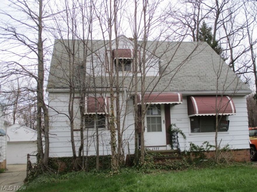 Bungalow with large eat in kitchen. 2 bedrooms and a full bath on the first floor and large bedroom up with many built in cabinets. Back yard is fenced in, located near public transportation and shopping.  Buyer will need to assume Euclid point of sale violations.  There is extensive work being complete on the property (rear wall is being replaced).