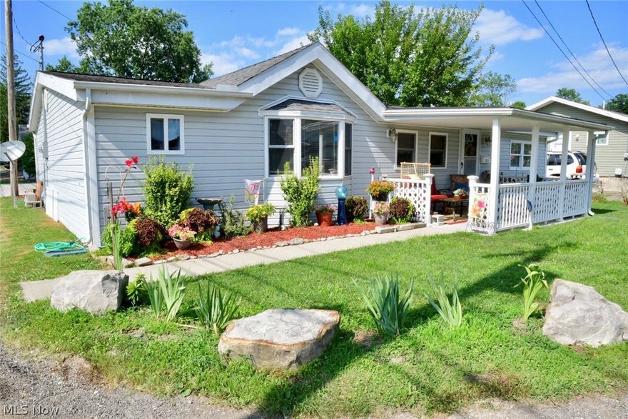 This adorable, 3 bedroom, ranch home is conveniently located on the north end of Zanesville, close to the hospital, Dr.'s offices, shopping, banking and many restaurants too! Everything has been replaced & updated including the roof, furnace, HVAC, vinyl siding, the bathroom, doors, windows & more! The kitchen boasts an abundance of beautiful white cabinets, updated countertops & ceramic tile flooring! There are 2 parcels included. The second parcel is located across the alley and would be perfect for a garden or to play a game of catch! You can also enjoy relaxing outside on the covered front porch! If you are looking for a home that has been updated & well maintained, look no further! It's move in ready! Also included is a one year home warranty for your added comfort & protection!