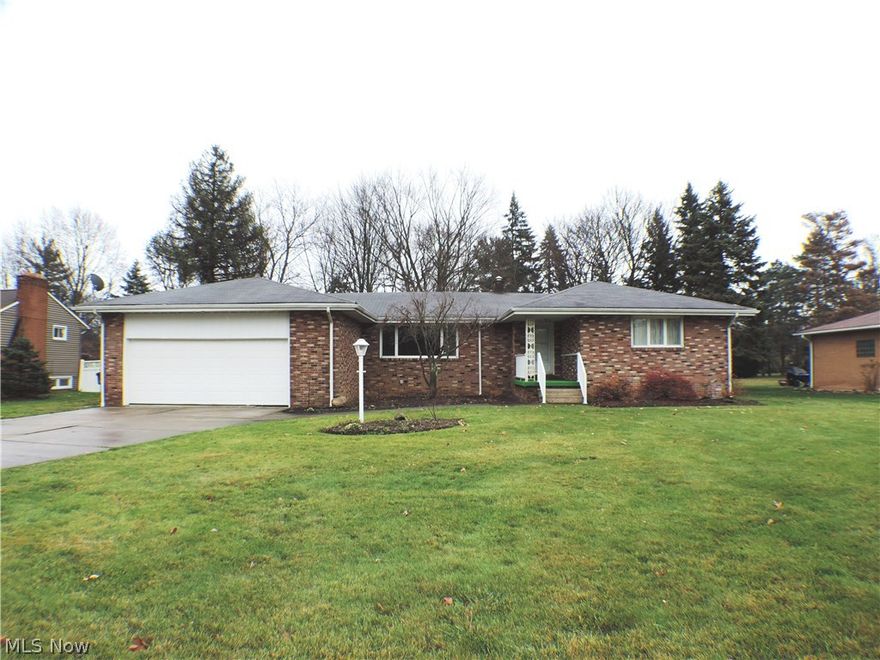 Must see updated ALL brick ranch home with 3 bedrooms and 2 FULL bathrooms. Inviting foyer with beautiful marble tile. HUGE living room with new carpet and recessed lighting. Large dining room perfect for gatherings. Open kitchen with newer cabinets, island, and flooring that opens up to the family room with a beautiful wood burning brick fireplace and hardwood floors. Master bedroom has stunning hardwood floors, double closet space, and full master bathroom. Two additional bedrooms that are very spacious with great closet space and stunning hardwood floors. Updated main bathroom with tile shower. Large first floor laundry room. This home sits on a very nice lot (.74ac) with 2 car attached garage, huge backyard, concrete patio out back perfect for get togethers, FULL basement with brick fireplace that could be finished off with endless possibilities. Walkup attic space for additional storage. Freshly painted throughout. Truly move-in condition!