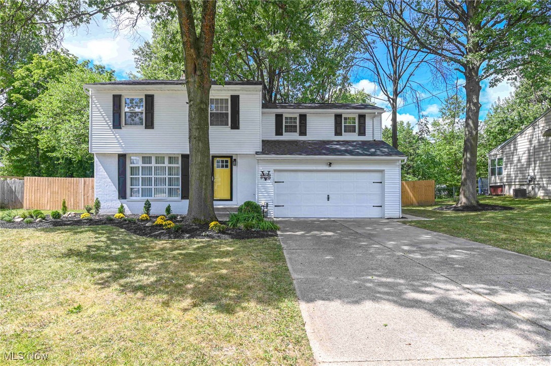 REINTRODUCED WITH STUNNING IMPROVEMENTS! Welcome to your dream home—this gorgeously renovated 4-bedroom, 2.5-bath stunner sits on a generous lot in the heart of Stow, offering the perfect blend of modern upgrades and everyday comfort. Step into a bright, open layout with vinyl flooring throughout and a chef-inspired kitchen featuring granite countertops, stainless steel appliances, and a classic subway tile backsplash. Bathrooms shine with marble-top vanities, including a luxurious double sink in the main bath, making busy mornings a breeze. Recent updates include all new exterior doors and locks, new interior doors with upgraded hardware, a brand-new patio slider, fresh paint, updated kitchen faucet and hardware, all new appliances, a finished utility room, updated trim, newly installed electric fireplace with accent wall, new kitchen backsplash, all new register vents, added wall shelving, refreshed front and backyard landscaping, and tree/branch removal. Enjoy movie nights or game days in the finished basement, or take the fun outside to your huge deck—perfect for entertaining. The large fenced-in backyard offers plenty of space to play, garden, or relax in privacy, and the shed adds even more value with storage, hobbies, or a workshop. With a 2.5-car garage, charming curb appeal, and a location close to parks, schools, and shops, this home is stylish, spacious, and completely move-in ready—schedule your private showing today and fall in love!