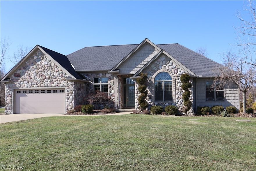 Beautiful ranch on 3.11 Acres. This is a truly custom designed home with a modern flair built in 2007. High end finishes throughout. Custom built cabinets in the kitchen with granite counter tops. Fisher and Paykel 2 drawer dishwasher. Fisher and Paykel built in convection oven. With a large center island with plenty of storage. Hard wood flooring throughout the kitchen. Master bath has a large walk in shower with 3 body sprays and an overhead shower. Travertine on the shower, sink and floor. 2nd bathroom has a whirlpool tub with a shower. Recessed lighting throughout the entire house. Brushed nickel hardware throughout the home. Very large poured concrete basement with 9 foot ceilings and glass block windows. The basement is spacious and waiting to be finished. Attractive well light exterior lighting. Trex decking, no maintenance. 2 car attached garage, Central air, There are also 3 redwoods on the property. Nice and private 3.11 acres West Geauga School System.