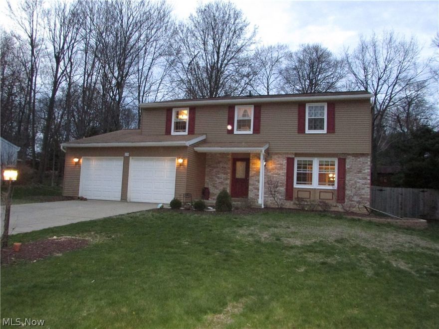 A stunning 4 bed, 2.5 bath Colonial in a desirable Munroe Falls neighborhood.  This lovely home has an updated kitchen that opens to the large family room.  A fireplace highlights the family room that opens to a covered porch.  The entire first floor has newer, beautiful flooring.  A large master suite has an updated bathroom.  The yard is fenced, full basement, 2 car garage, and so much more.