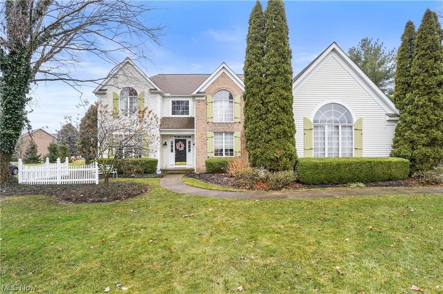 This is the one you have been waiting for!  This home is impeccably cared for, updated & shows like a model home! You will be welcomed by a beautiful, curved staircase in the foyer.  Solid hardwood floors thru-out most of the 1st floor adorn the freshly painted interior that features a well-designed floor plan that includes 9’ ceilings & plenty of natural light! The chef’s kitchen offers a 36”gas cooktop, pot filler & double wall ovens! The custom island has a gorgeous walnut countertop, lots of storage & built-in SS microwave. New Quartz counter tops, backsplash & deep single bowl sink. There’s a pantry, baking center & large eating area that leads to the deck. The office is perfect for working from home. Relax in the living room that connects to the stunning formal dining room. The family rm features a new, black walnut mantle over a wood burning fireplace, w/gas logs! A wet bar boasts a copper sink & plenty of storage while a wall of French doors lead to the deck.  Updated lighting thru out, laundry rm & half bath w/granite top complete the 1st floor.  Upstairs, are four bedrooms, a bonus room and 2 full baths. The luxury primary suite is a retreat, w/ two, walk-in closets each w/organizers, a large steam shower w/glass vent, jetted tub & double undermount sinks in the vanity w/ marble countertops! The adjoining bonus room is used for a dressing area.  An updated bath features 2 vanities w/Quartz countertops & 3 ample sized bedrooms, many w/organizers.  The finished lower level adds versatility to the home, offering a rec room, bar/exercise area & wine cellar!  Store games, dishes or decor in the wall of built-in shelving, as well as plenty of storage in the unfinished area.  Outside, the expansive back deck boasts all new decking surface. Enjoy year-round privacy in the fully fenced backyard w/In-ground sprinkler system. A stone path leads you thru the rose arbor, to the extra-wide driveway & 3 car garage where you’ll find an extra bay & Nature Stone flooring!
