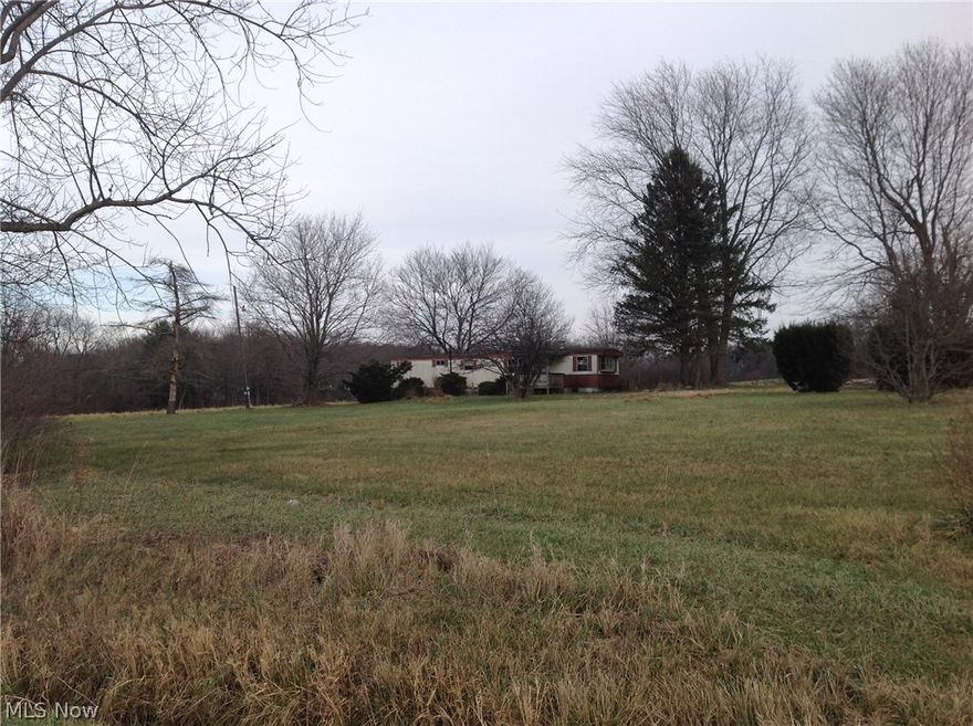 Great piece of property to build on.  Well and septic has just been tested and passed.  New pump installed two weeks ago.  Shed on property.  Mobile home will be removed in the next few weeks.  Quiet and peaceful and the  perfect spot for a modular, mobile home, or new construction.