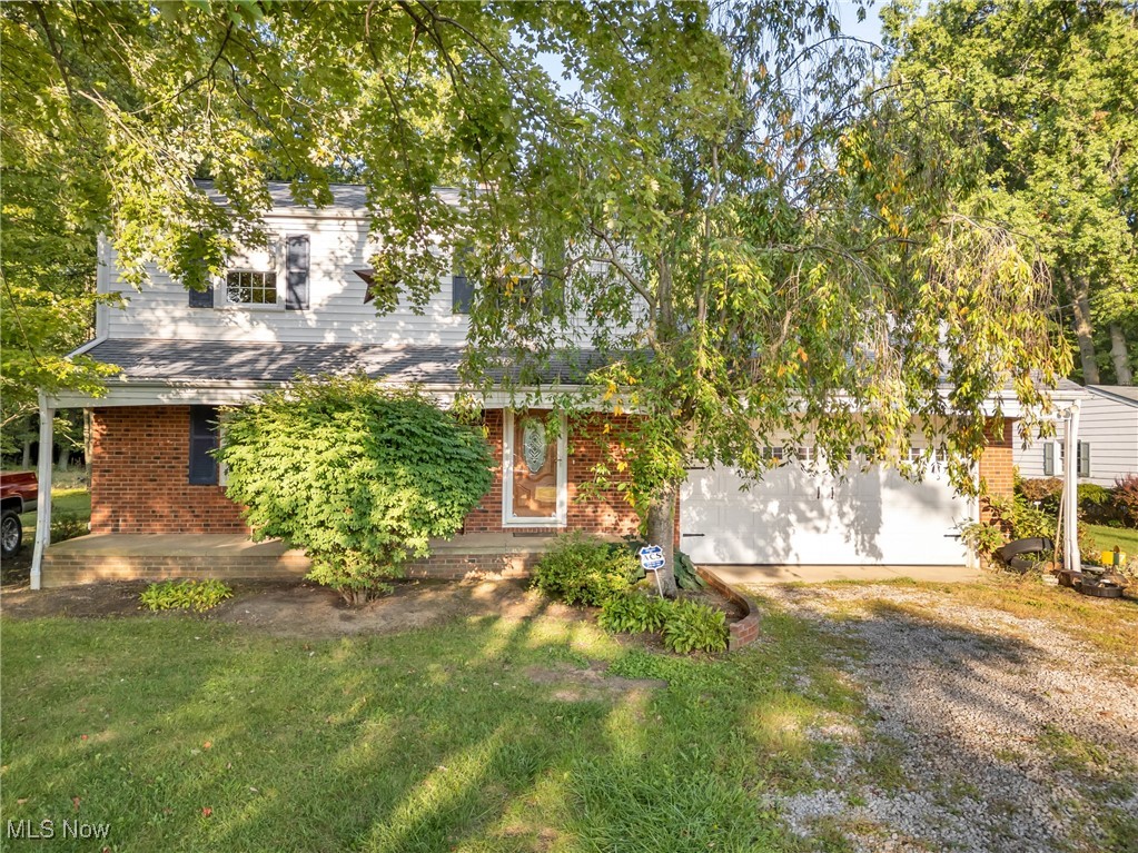 This beautifully maintained colonial home sits on nearly an acre of land, ideally set back off the road with the Vermilion River right across the street. A welcoming front porch invites you in, where you'll be greeted by original hardwood floors that flow throughout the home. The sun-filled living room features large windows offering serene views of the front yard. Adjacent, the bright and
inviting dining room is perfect for family gatherings, with two windows overlooking the spacious backyard and direct access to the kitchen. Upstairs, you’ll find three comfortable bedrooms and a full bathroom complete with a jetted tub and shower. The finished basement adds even more living space, featuring a bar area and the potential for a fourth bedroom. The laundry room is
conveniently located just off the family room. Step outside to your private backyard oasis and enjoy the in-ground pool, expansive patio area, and easy access to the half-bath via sliding glass doors from the garage, making outdoor entertaining a breeze. Additional highlights include a new septic system and radon mitigation system both installed in 2023. An excellent location with quick access to Route 2. This move-in-ready home offers charm, space, and the perfect setting for family memories inside and out!