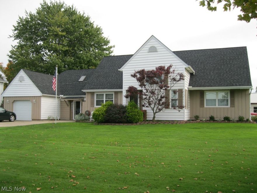 You have to see this one!  Beautiful house with over 2500 sq ft and a 2 year old 60x40 ft.building with heat and water!  Work and live on this rural property that backs to a 100 acre Nature Preserve! The building features radiant heat and 3 phase electrical (utilities separate from house).  It is well insulated and has 3 large overhead doors.  The home is beautiful!  A custom winding staircase leads to big bedrooms that all have full bathrooms.  Great kitchen features Corian counters and Maple cabinetry.  Lots of space!  Located 3 minutes from Rt. 10/480.  Eaton Twp. means NO RITA!  Call now for easy showing.