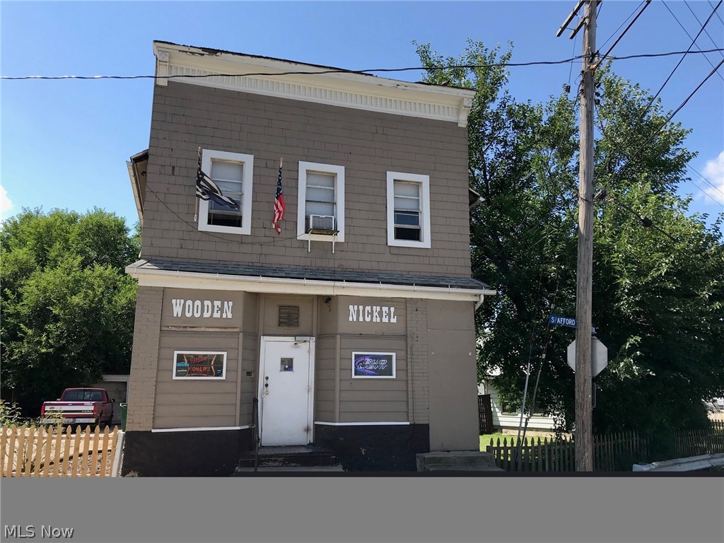 BUILDING FOR SALE ONLY. Business not For Sale. 2nd Floor unit with 4 bedrooms, full bath, kitchen and in suite laundry. 1st floor can be converted to 1-2 units or used for business purposes. Building is zoned for commercial use. Plenty of parking with 1 car garage and yard. First floor has good space with many remodeling possibilities. Bring your imagination. Motivated Seller. Appliances are negotiable. Call for your private showing today.