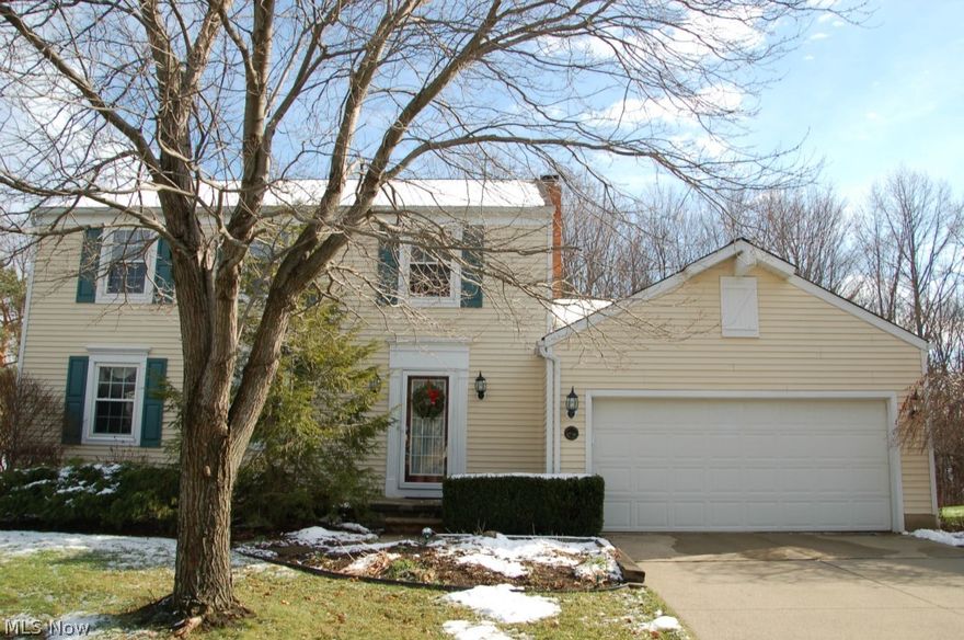 Open the front door of this well maintained colonial and you will feel right at home. The family room features a wood burning fireplace, wood book shelving and a newer sliding door. The door leads to a 20x20 deck and pergola that overlooks the wooded backyard. A sunny and bright kitchen has newer Kraft, birch cabinets, Corian counter tops, under cabinet lighting, wood laminate flooring and all appliances stay including the washer and dryer. The large formal living room, dining combination are perfect for entertaining. Built in shelving and a window seat adds to the warmth of the dining room. The four bedrooms on the second floor are bright and inviting. A finished basement gives the added space for a game room. Go out to the backyard and enjoy nature. The beautiful trees, flowers and birds give you a sense of peace. Roscoe Ewing Park and Champion Creek are located behind the woods. Newer updates include: windows'12, roof'01, hot water tank'14, kitchen refrigerator'14 and furnace'05. Al