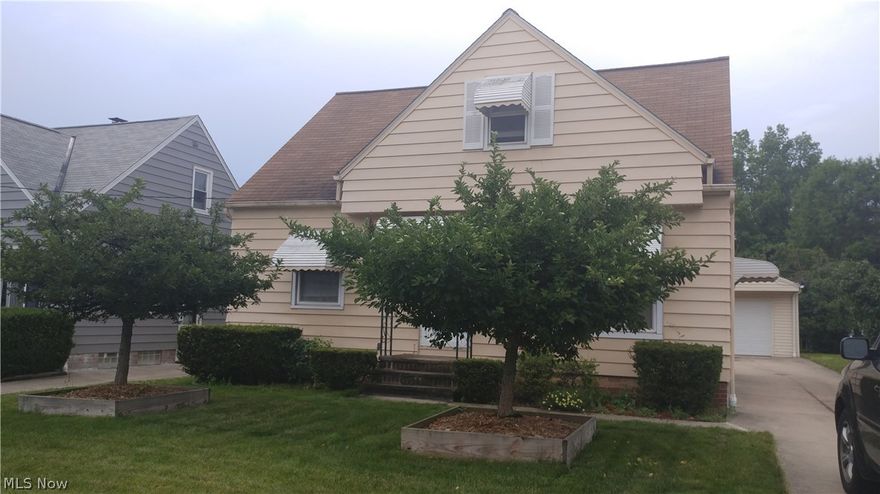 4 bedrooms two on first floor, home with newer kitchen with an pantry, home with newer windows, roof and driveway  Driveway side basement wall waterproofed as a precaution, garage floored replaced in 2011, garage vinyl sided 2012, garage ear off with new roof 2016, carport was enclosed will fit two small cars or an boat, house chimney replaced 2008, house exterior tuck pointed 2018, house with tear off roof 2010,  house exterior walls insulated 2010, windows, doors by Stanek 2010, High Efficiently furnace and Central Air 2012, Basement glass block windows, low flow toilets replaced 2013, hardwood floors under the carpets.  Small freezer and microwave does not stay.  You have an 2 car garage plus another 1 more closed carport.