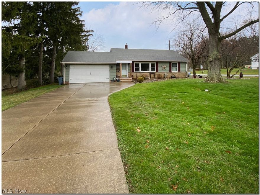 Welcome home to this beautifully updated ranch home with attached 2 car garage on 1/2 acre.  First floor features hardwood flooring, Spacious eat in Kitchen features newer appliances, newer cabinets, flooring, lighting.  All appliances staying. Full finished basement with 1/2 bath. Walk up attic, enclosed patio behind garage.