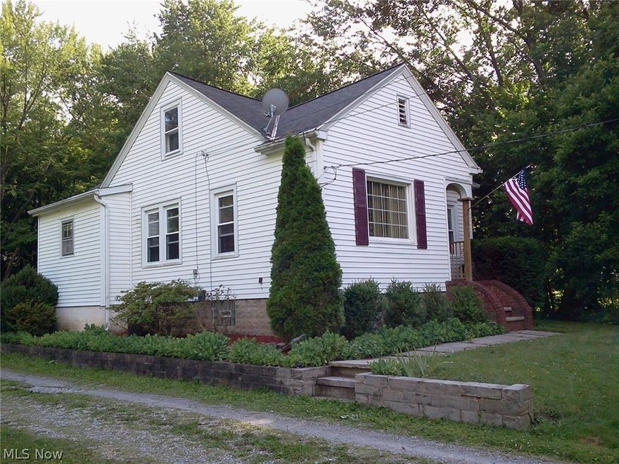 Adorable 2 bedroom home in Elyria township with almost a half an acre. This home offers an eat in kitchen, dining room, living room, full bath, built-ins in the hallway, and 2 bedrooms on the main floor. Walk up attic offers plenty of storage or could be finished for an additional bedroom. The basement has one side partially finished as a rec area and the other side is the laundry area.  Many updates have been made; some windows, added insulation, newer furnace, and newer hot water tank. The owner is also in the process of adding a 12 ' x 13' deck  off the back of the home.  The outside boasts a 2 car garage with electric and a very nice size yard backing up to woods.

All this, in the township, for under $100,000. Rural setting, yet only minutes to shopping, Rt. 57, Rt. 2, and the Ohio Turnpike.   Don't miss this one.
