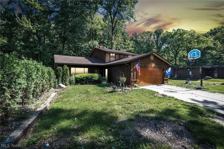 Love nature and convenience? Check out this 4 Bdrm 2 Bath Estate Home. 1.11 Acre lot with beautiful mature trees and backs into the Metroparks. The yard is fenced and has great raised beds for gardening. Owner started building new shed so the foundation is there for finishing. 1st level has all the entertainment space you'll need with a Formal Living room & Dining room. Eat-In Kitchen offers all appliances, loads of counter space, Updated Corian Counters and a Breakfast Bar that opens to Family room, great for serving guests. Family room has a handsome Wood burning Brick fireplace, neutral carpeting, a 4th bedroom or den/office, laundry room and full bath. 2nd Level has 3 Carpeted Bedrooms with ample Closets. Master bedroom has 2 sets of Double Closets and connects to a spacious Main Bath with ceramic flooring and updated premium finished counters. Closet systems in all closet.  Roof Tear off approximately 10 yrs. Fabulous location is near all the newest shopping, restaurants, airport