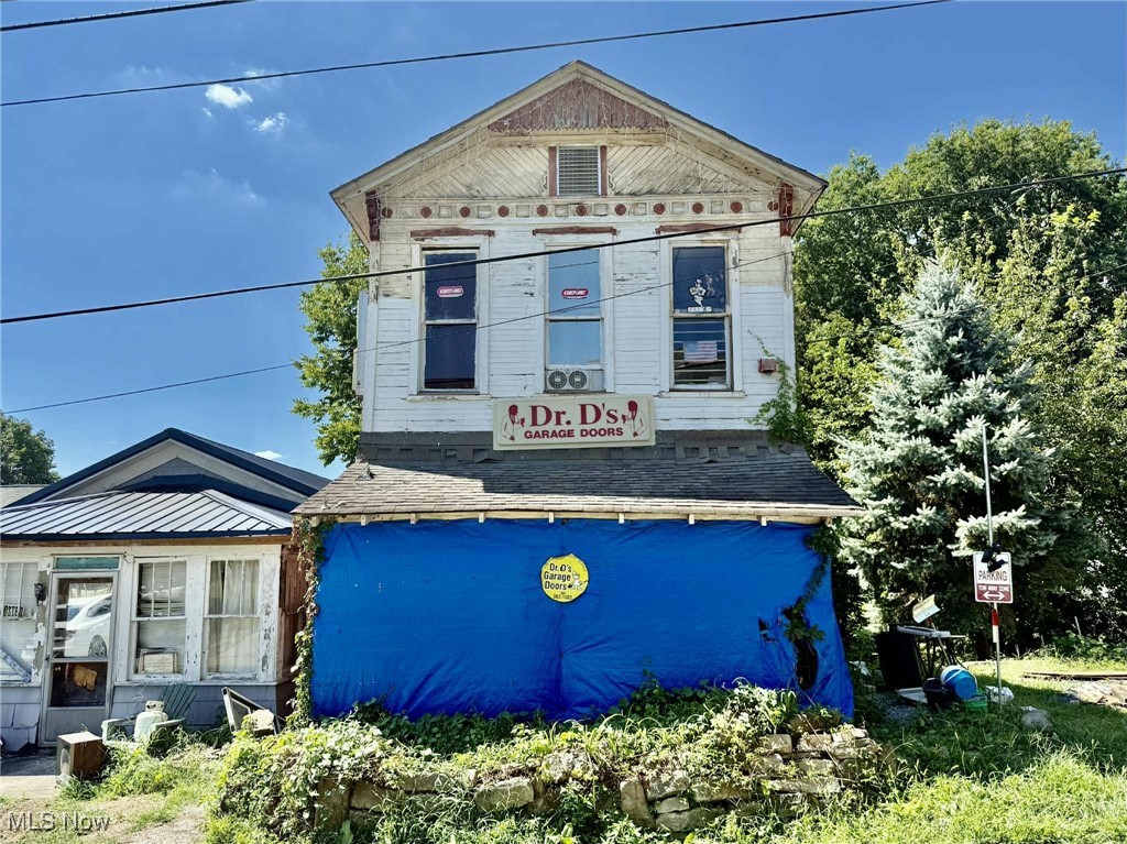 Calling all investors! Fixer upper home ready for a new life. Lot next door with carport conveys with home, there used to be a garage there. Property sold as is. No guarantees. No warranties. Could be sold with 805 Rigby as a package deal.