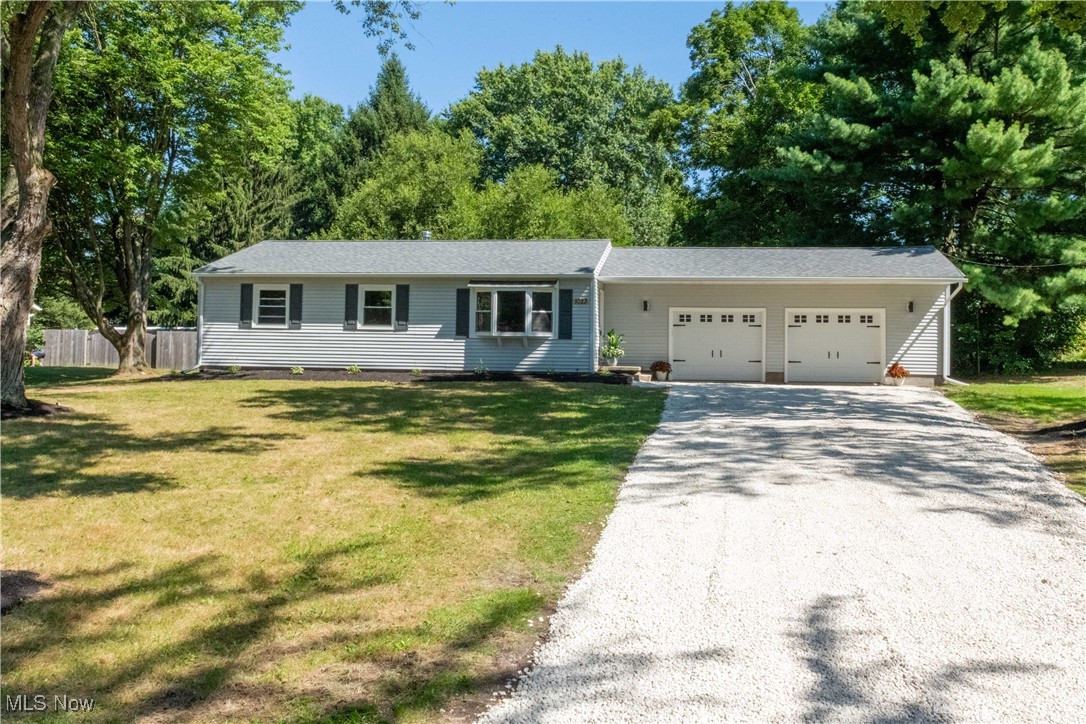 Make this beautiful 3 Bedroom, 1 full Bathroom ranch with a 2 Car attached garage sitting on 1/2 acre of property in Wadsworth township your home today! This newly renovated property offers the quietness of country living while being only 10 minutes from shopping areas. You'll have a piece of mind with all of the exterior updates. New roof (complete tear-off of existing), new windows, new garage doors with openers installed. New Central Air with newer high efficiency furnace. New hot water tank as well as water treatment center. 6-panel exterior and interior doors installed throughout the home. The center piece is the completely renovated kitchen with new cabinets, countertops, and Kitchen Aid appliances. Off the kitchen is a large deck overlooking the backyard. The full bath has been updated with a new shower, vanity, toilet, and lighting. Each of the 3 bedrooms have new plush carpet installed while being complimented with luxury vinyl planking in the common areas. As you walk downstairs you will be greeted with a freshly waterproofed and painted basement. Come check this gorgeous home today!!