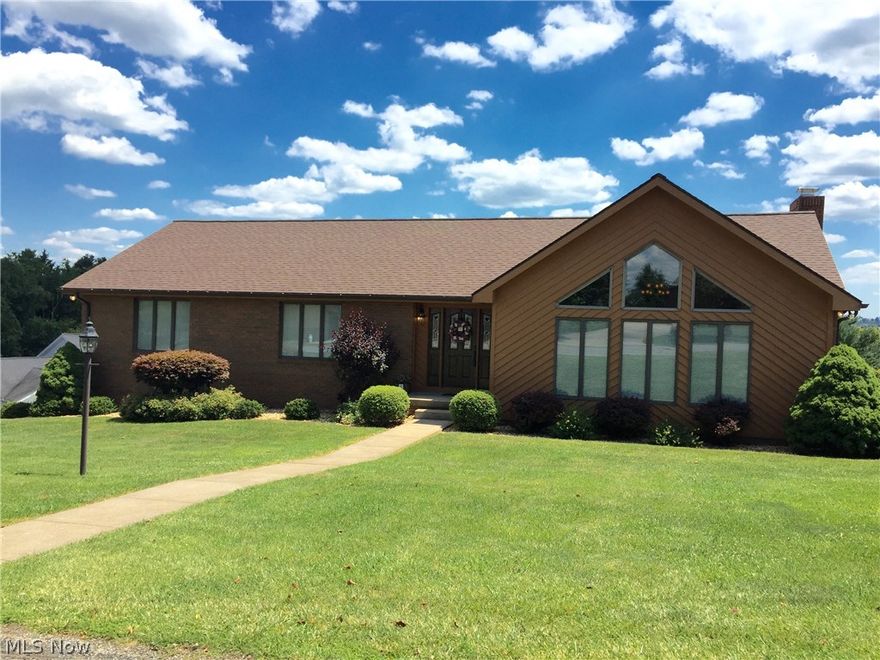 SOLID BRICK HOME WITH CEDAR ACCENTS-TOTAL LIVING AREA OF 3808 SQ. FT. PER OWNER- If your looking for that move in condition home, stop looking this is it. Fully equipped kitchen, impressive cathedral ceilings 1st floor family room having a fantastic view of the neighborhood including an elegant fireplace, gracious dining room, Beautiful finished rec. room and fireplace on the lower level. extra large over sized garage 28 x 28. 1430 sq. ft. finished on the lower level. ALL NEW APPLIANCES INCLUDING WASHER AND DRYER PLUS NEW LIGHT FIXTURES WITH FANS. Seller is agent related.