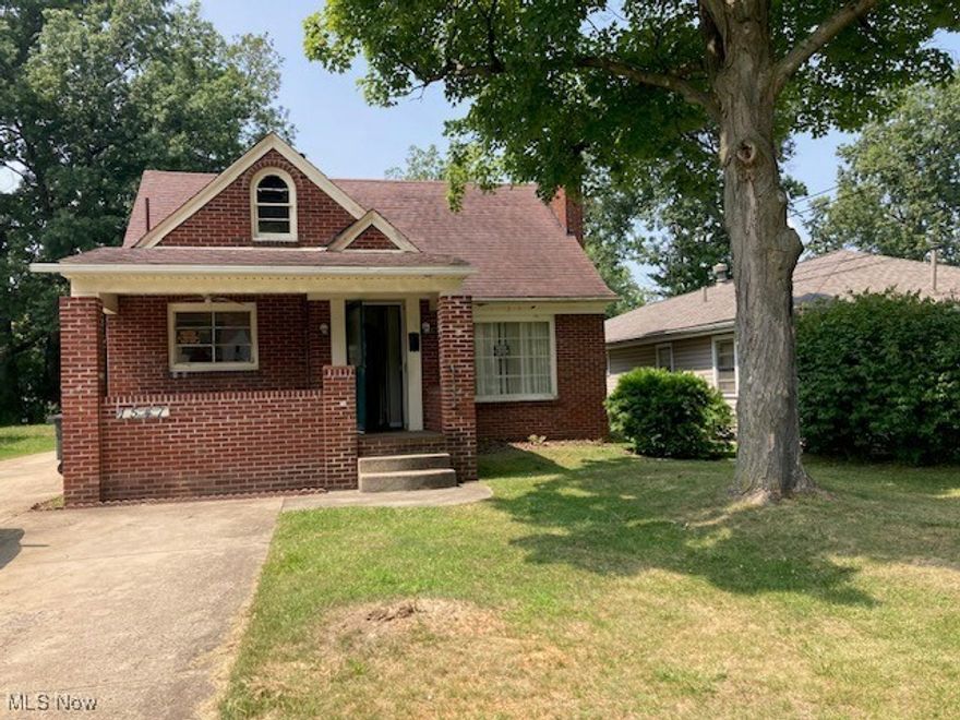 Brick Cape Cod with front porch. The home needs some fixing up but can be a real charmer. Good size kitchen. Full basement. Roof about 15 years old. 2 full baths -  one on main level, one up. Hardwood floors in the living & dining rooms. Fireplace is closed up for insurance purposes. Single car garage.