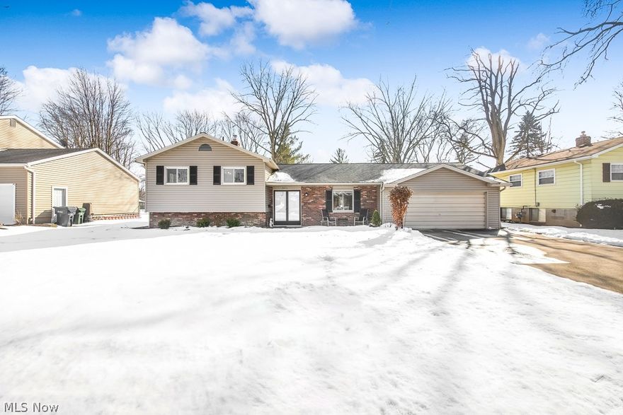 When you walk in the door you will notice the vaulted living room ceiling which continue into the dining room and kitchen. When you walk upstairs you will find a full bath and 3 oversized bedrooms. On the bottom floor you will find a large second living space complete with fireplace, a half bath and laundry room with plenty of storage. The huge backyard boasts a large cement patio which where your kids and pets can play safely because the yard is fully fenced in. There is a newer shed that you can keep all the lawn care tools, patio furniture, and kids out door toys in.The 2 car garage has plenty of space for 2 large SUVs and then some! There are new blinds and windows, motors on AC and furnace, back door in garage, toilet, lighting fixtures throughout home and updated landscaping! All this home needs is for your family to move in and enjoy!