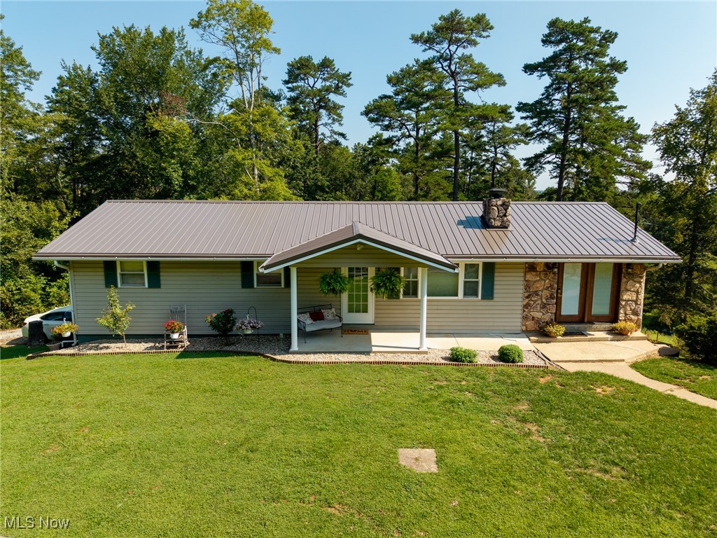Experience country living at its finest in this beautiful ranch home, perfectly situated on 7.5 acres of open land and wooded landscape. Offering 3–4 bedrooms and 3 full baths, this property is designed for both comfort and recreation.
Inside, the galley kitchen features rich, solid oak cabinetry and sleek stainless steel appliances, opening to a welcoming dining area and spacious living room that’s perfect for gathering with family and friends. The primary ensuite provides a private retreat, while two additional bedrooms and a full bath complete the main level. A bright and versatile bonus room offers endless uses—whether as a sunroom, office, or cozy sitting area.
The finished walk-out lower level expands the home with a large bonus room currently used as a 4th bedroom, but it could just as easily serve as a recreation room or family room. This level also includes a full bath, oversized laundry room, and abundant storage space.
Step outside and take in the property’s natural beauty. The back deck overlooks an expansive yard and a sparkling, stocked pond teeming with bass, catfish, and bluegill. A charming gazebo invites you to relax by the water, while wide-open spaces are perfect for entertaining, gardening, or evening bonfires. For hobby farmers, a 2-stall barn and ample pasture provide room for animals or projects, while outdoor enthusiasts will enjoy the ATV trail that runs along the rear of the property, as well as excellent hunting with trophy whitetail deer harvested on site.
Updates and features you’ll love: remodeled bathrooms (2020), new HVAC system (2023), brand-new metal roof (July 2025), attached garage, and a convenient drive-through carport.
From peaceful mornings by the pond to adventurous afternoons outdoors, this property offers a rare combination of modern updates, recreation, and country charm—all just waiting for its next owner to call it home.