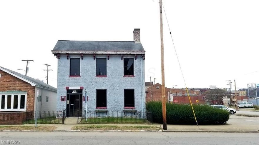 2976 Square Feet of Office space with 2 Lobbies, 2 Half Baths & approximately 8 Private Offices, 26 Plus Car adjoining parking Lot, Corner Location in Downtown Zanesville, Exterior to be rehabbed in the Spring