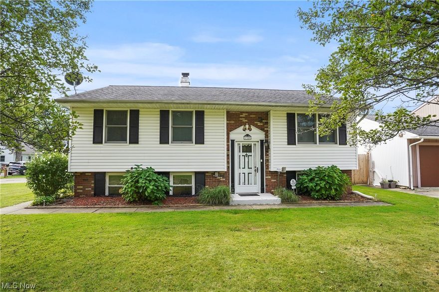 Nestled in the picturesque town of Ashtabula, this charming single-family home offers a perfect blend of comfort, space, and modern living. The main floor of the home welcomes you with an open-concept living and dining area. The abundant natural light creates an inviting atmosphere, perfect for entertaining family and friends. Main floor features a full bathroom with bonus bidet to accompany the three bedrooms. The unique bi-level layout offers versatility and separation of living spaces. Downstairs, you'll find additional living space with a second kitchen area, perfect for a family room, home office, or recreational area. A second full bathroom on the lower level has been converted to a Safe Shower. The lower level has the ability to have a bedroom, kitchen and laundry areas making this a perfect place for additional living.  A standout feature of this property is the large oversized paved driveway, providing ample parking space for multiple vehicles with 2 car detached garage. Updat