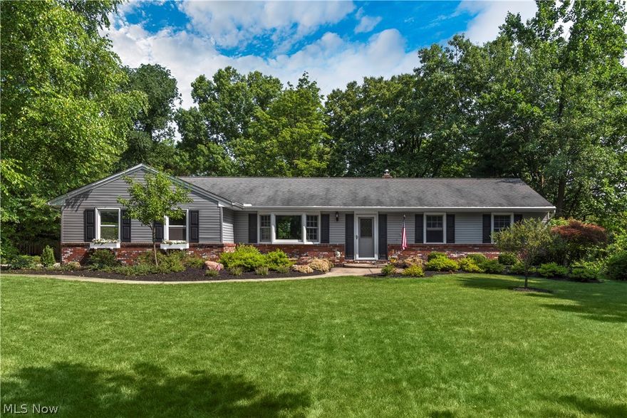 Amazing opportunity to own a beautifully maintained and updated ranch in Brecksville! Established neighborhood/street with mature trees throughout. Great location close to own, restaurants, and shopping. As you walk through the front door your immediately greeted with clean white woodwork/crown molding, finished natural hardwood floors, and a gorgeous formal dining room. Space is a plenty as you walk into the open concept kitchen that includes granite countertops, recess lighting, tiled backsplash. Tiled wood burning fireplace is the centerpiece of the spacious living room. Off the living room, a vaulted enclosed patio is the perfect place to have company, enjoy a meal, or sit and have your morning coffee. Cozy full length finished basement with bar top offers more room to relax and entertain. Basement also includes full bath, office, and workshop. Other updates include 3 full bath remodels, brand new extra wide driveway, paint throughout, refinished hardwood floors and much more. Tast