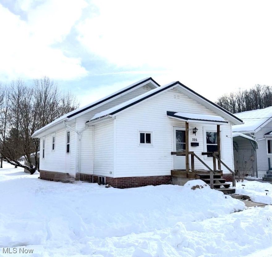 Check out this newly remodeled 1 story home that is truly move-in ready.  This home offers flexibility with 2 bedrooms on the main floor and an additional 2 bedrooms in the lower level, perfect for a family room, home office, or additional bedroom space. There is a nice open floor plan. As you enter you have a large mud room for coats and shoes. The living room has a steel ceiling and a barnwood wall giving it lots of character.  The kitchen features stainless steel appliances and offers a clean modern look that is both stylish and functional. There is a spacious remodeled first floor full bath. Recent updates include a new metal roof, a new central air unit and hot water tank, a new garage door, newer vinyl windows, and all new paint and flooring. There is a 2-car detached garage and a covered back deck.