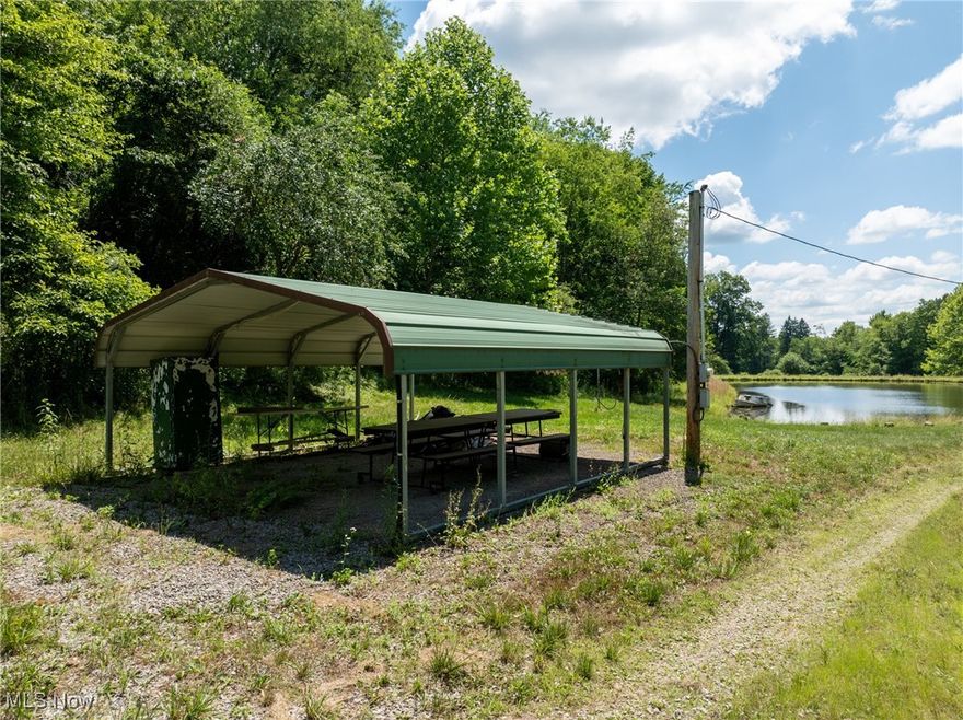 Welcome to your own slice of paradise at 5659 Steubenville Rd SE, nestled in the heart of Carrollton, Ohio! This incredible 81-acre property is a nature lover’s dream and the perfect canvas to build your ideal home. Imagine waking up to breathtaking views and having ample space to explore, relax, and create lasting memories. The property features a picturesque stocked pond, ideal for fishing enthusiasts, where you can spend tranquil afternoons casting a line or simply enjoying the serene surroundings. Gather your friends and family at the charming pavilion, perfectly designed for outdoor gatherings, barbecues, and celebrations. For those seeking a rustic escape, the cozy bunk house offers a great spot to unwind after a day of adventure, while the convenient wash house ensures comfort during your outdoor excursions .Nature enthusiasts will delight in the abundance of raspberry bushes dotting the landscape, providing delicious, fresh treats right from your backyard. Whether you're looking to hike through scenic trails, camp under the stars, or simply bask in the beauty of the great outdoors, this property offers endless opportunities for recreation and relaxation. Don’t miss out on this rare opportunity to own a remarkable piece of land that combines natural beauty with the potential for your dream home. Schedule a visit today and start envisioning the lifestyle you’ve always wanted! Call you're favorite Realtor and schedule a showing today! No one to walk property without an appointment and an agent. Thank you!:)