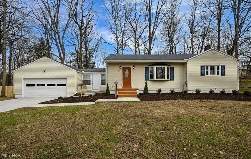 This beautiful ranch is located in Goodyear Heights, just a few minutes from the park! The lot is a wooded 0.6336-acre! It features a completely renovated home with a large living room that opens into a brand-new eat-in kitchen with stainless steel appliances, which include a gas range, new cabinets, and quartz countertops. The other side of the living room opens to a hallway with 3 bedrooms and a brand-new full bath. New flooring throughout the entire home. The master bedroom has a large closet and a linen closet. The basement includes a recreation room and a bonus room, perfect for an office or workout area. There is a brand new full bath with a walk-in shower. Additionally, there is a laundry area and ample storage space, as well as a brand-new furnace and a new hot water tank. There is a breezeway from the two-car garage into the home, which keeps you dry and warmer for our Ohio weather! Minutes to the park, expressway, downtown Akron, and public transportation. It is approximately 50 minutes to Cleveland.