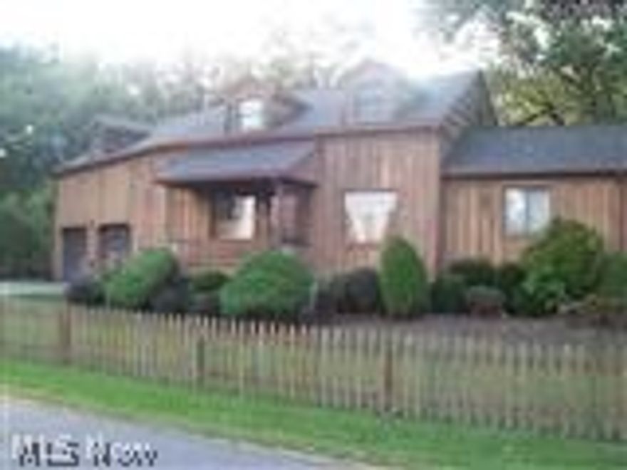 Motivated Seller , could be a short sale, seller has already begun paperwork and communication with bank. Owner is replacing electric box and having a pest treatment completed. Inspections have been done.  Home is very unique with a cabin feel, wood décor throughout. Large eat in kitchen with lots of windows viewing the backyard. Lot is half an acre.  First floor bedroom and bathroom. Walk out basement could be finished. The garage is every mans dream! Big and tall. There is an unfinished addition being used as an attic but could be a fourth bedroom. Seller has had offers but the time frames of move in dates and needed repairs did not work.