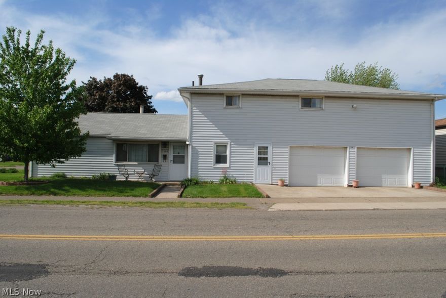 Versatile is the only way to describe this well kept Canton home!  Featuring 5 bedrooms, it is perfect for a large family or bedroom 3 on the upper level could be used as a kitchen to make a separate suite with it's own entrance from the garage.  The main floor has a huge living room, eat-in kitchen, 2 bedrooms and a half bath.  On the 2nd floor you will find 3 more spacious bedrooms and a large full ath with linen closet.  The 29 x 30 garage provides plenty of room for cars & storage and features a grease pit for the do it yourself mechanic.  Updates include roof 2003, garage doors 2012 and furnace 2013.