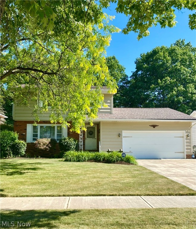 This beautiful Center Hall Colonial is updated and an immaculately maintained home that sits right next to the majestic Bedford Metro-Park Reservation and Tinkers Creek Recreation Area. This home is on a peaceful, quiet, cul-de-sac street and overlooking the Bedford Reservation. Relax under your brand new custom lighted pergola or on your quiet patio. This fenced in yard is absolutely gorgeous! This fantastic 3-bedroom, 1.5 bath home is in the desirable Shawnee Lake Subdivision! The neutral paint, newer carpet, and many other updates all throughout this home give it such a comfortable and refreshing feel! The home includes a formal living room, dining room, large eat-in kitchen, a gorgeous four season room with custom ceiling, a family room and a heated patio room. The home has tons of storage space, 2-car attached garage and all appliances stay including the washer and dryer. New roof /full tear off (2019) and new gutter guards (2019). The beautiful partially finished basement is 'bon
