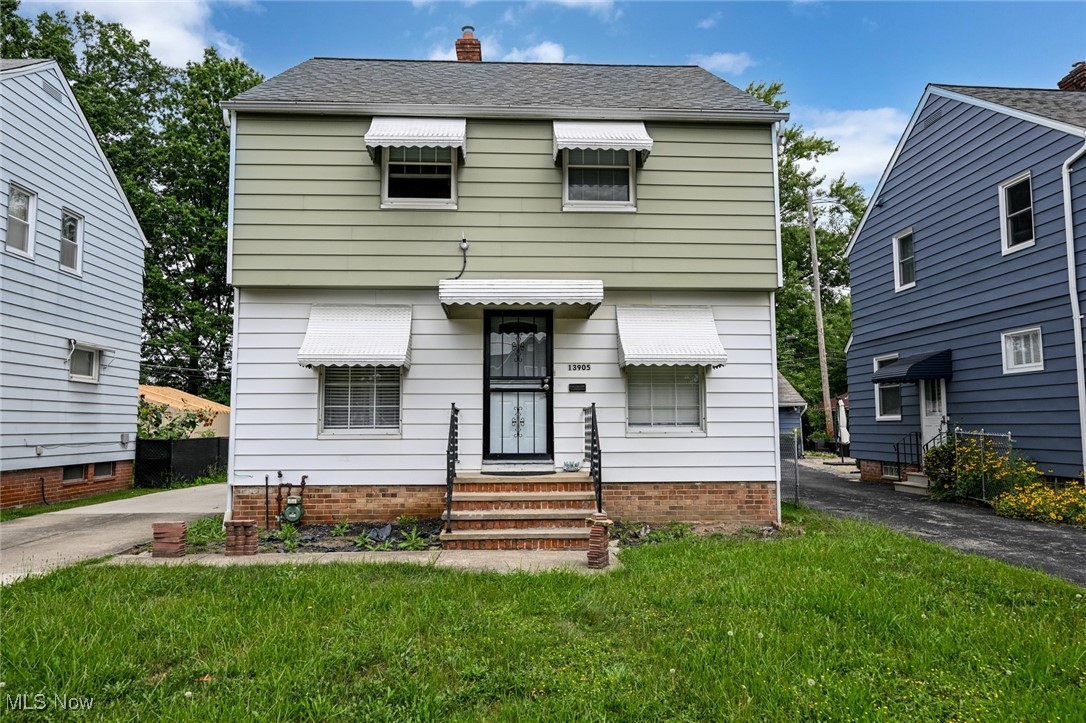 Look at this beautifully renovated Colonial in Garfield Heights! This home offers 3 nice sized bedrooms and 1.1 Baths! The main level offers a long kitchen with dinette area, charming dining room, closet, and fabulous living room with gas fireplace and plenty of natural light! The second level offers full bedrooms, closet areas, and full bathroom! Enjoy time in the partially finished basement area/recreation room! Basement offers a full utility and laundry area and .1 bathroom area! ALL appliances stay, newer refrigerator, stove, washer and dryer! Updates include: NEW ROOF going on September 13, 2025, luxury vinyl flooring throughout home on both levels, central air unit, furnace, interior paint and ceilings redone, appliances, Toilets, kitchen cabinets/sink, light fixtures, blinds, ceiling fans, updated electrical panel, both security doors + back and main entry doors, carpet in basement, shower/tub update, underground electrical wiring to garage (4K in 08/2025) and newer garage door! Owner has completed all but 2 minor POS items. Items left for buyer to assume that are known are: remove tree stump in back of backyard and make man door to garage operable. Nice Big Yard! 2 car garage! 2017 Hot water tank. Close to parks, hospitals, restaurants, shopping, freeway access and more! POS (light) to assume by buyer. Contact today to see or with questions! 24 hour notice for all showings.