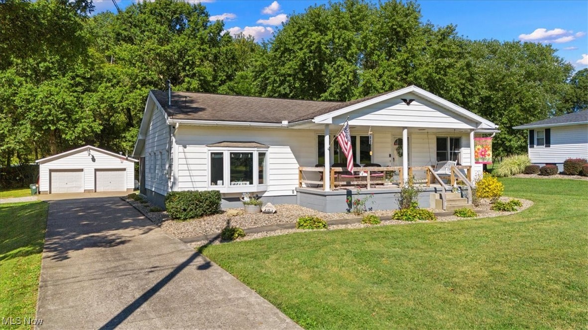 Fall in love with this spacious ranch in Belpre! Set on nearly an acre (.87) across two lots, this home offers room to spread out and plenty of charm. Inside, you’ll find generous rooms great for entertaining, a cathedral-ceiling family room with access to the cozy screened-in patio, and a kitchen walkout that makes morning coffee outdoors a daily delight. The primary suite opens to a private deck overlooking the in-ground pool...your own backyard retreat! Need more room? The basement is ready to serve as a great additional living space. Along with this home being lovingly cared for, the sellers have updated the electric to 200amp service, replaced the hot water tank, and remodeled the bathroom in the primary suite. Outside, you can enjoy lovely landscaping, mature trees, and a small creek at the back of the property. There is also a spacious two-car detached garage with the bonus of a rear one-car garage, ideal for multiple vehicles or hobby space. With space, style, and that inviting poolside lifestyle, this home is ready for its next chapter.