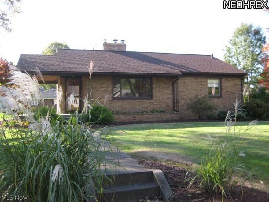 Impressive Brick Ranch built in 1953 & lovingly cared for - 2 bedrooms. large closets. One bedroom's carpet has been removed  to show beautiful hardwood flooring.Living room fireplace has gas logs. Nice sized kitchen, ample cupboards with dinette. Fresh paint in lower level. Second fireplace is wood burning, area for new bathroom, commode already in place, Lots of possibilities. Work bench will stay. Two car garage, door opener and built in storage cabinets. Asphalt drive way will be resurfaced. Large covered porch accommodates front door and side door. Great flat landscaped lot & shed. Newer roof. Extra storage in attic with pull down stairs. Quick Possession!! Come take a look.