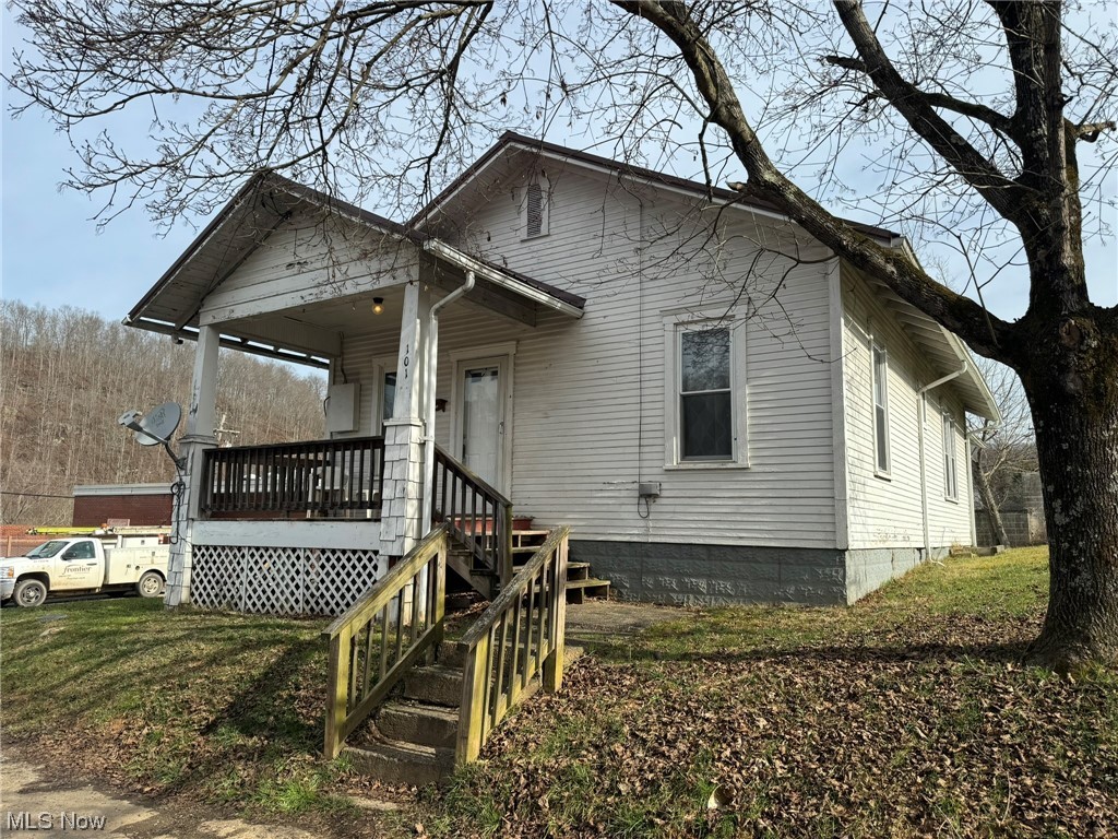 Welcome to 101 Jarvis Street, a cozy and inviting one-level home in the heart of Grantsville, WV. Spanning 1,184 square feet, this home offers a comfortable and efficient layout, perfect for those seeking simplicity and convenience. Featuring 3 bedrooms and 1.5 bathrooms, this home is move-in ready, with fresh paint and durable laminate and vinyl flooring throughout. The large living room provides ample space for relaxation and dining, making it the heart of the home. The horseshoe-style kitchen is equipped with a dedicated pantry, ensuring plenty of storage. The master bedroom offers privacy and convenience, complete with a half bathroom (that could be converted to a full bathroom with a small standup shower added) and access to the laundry room. The additional bedrooms are both 11x11, with the full bathroom located in the hall between them. Situated in the Town of Grantsville, this home is just a short walk from local shops, restaurants, and amenities, offering an ideal blend of quiet town living and convenience. A 24 hour critical access hospital is another great addition to the town. On-street parking is available at the end of the street, adding to the ease of town living. Whether you're looking for a starter home or a promising rental opportunity, 101 Jarvis Street presents a fantastic option. Embrace the simplicity of one-level living in a location that puts you close to everything Grantsville has to offer.