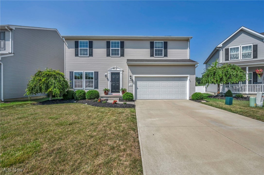 Welcome to this spacious & beautifully maintained 2012-built colonial located on a quiet, low-traffic street in the highly sought-after Waterbury community of North Ridgeville. Featuring 9’ ceilings and an open, light-filled floor plan, this home offers the perfect blend of function & comfort. First floor includes a versatile front playroom and a great room that flows into a flex space—ideal for an office or formal dining area—and a large eat-in kitchen. Upgraded kitchen boasts 42" cabinets with crown molding, sleek stainless steel appliances (2019), added 5-burner gas range, and two pantries sure to impress any home chef. Current owner removed all carpeting on the first floor and installed elegant, durable luxury vinyl tile flooring. From the kitchen, sliders open to a stunning stamped & colored concrete patio with a built-in firepit—perfect for entertaining. Fully fenced backyard offers space and privacy for outdoor enjoyment. Upstairs, you’ll love the convenient 2nd-floor laundry room w/linen/storage closet & included premium washer/dryer. Spacious primary suite includes a huge walk-in closet, personal linen storage, and an en suite bath with a comfort-height vanity. 2 additional spacious bedrooms plus a large loft provides the flexibility for a second living room, media space, playroom, or office. Full, deep, open basement is plumbed for a future bath and ready to finish. Smart thermostat & ring doorbell included. Enjoy all Waterbury has to offer—community pool, two playgrounds, scenic walking trails, and easy highway access. A truly exceptional home!