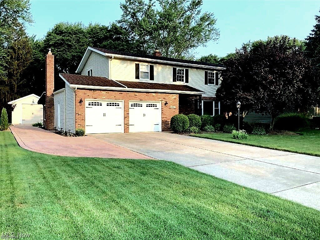 One of a Kind Pristine Bretton Ridge 4 large bedrooms with hardwood floors. 3 baths (2full/1 1/2) 3 +Car Garage brick colonial! Gorgeous 23 x 14 sunroom! Extra long driveway with another STAMPED concrete drive that leads all the way back to a STUNNING 18x26 INSULATED GARAGE that will make your jaw drop! This garage has a new 10’ garage door and 11’6” interior ceiling. Dream hideaway for the car buff, boater, home gym enthusiast, etc…. Possibilities are endless! 2-Car attached garage has bump out for additional storage with Nature Stone flooring that also extends to walkway & private front porch.
Interior home amenities include: Hickory cabinetry in kitchen with plenty of cupboards & kitchen island on wheels. 4 bedrooms up with HARDWOOD floors. Owner’s Suite has slider to private SUN DECK to watch the sunsets. Family room features peg-board hardwood flooring with BRAND NEW high efficiency Iron Strike wood burning stove insert for those chilly winter nights. Serene backyard with n
