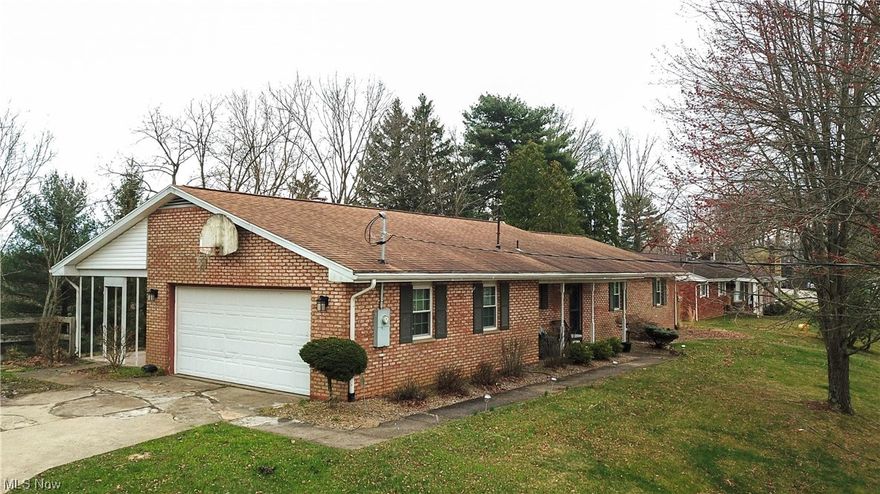 This welcoming ranch-style brick home offers a blend of traditional charm and contemporary open floor plan living. It features 3 bedrooms on the main level and an additional bedroom on the lower level, complemented by 3 full bathrooms, two on the main floor and one in the lower level, ensuring ample space and privacy for residents and guests alike.

The heart of this home is its spacious main living area, where the kitchen, dining, and living spaces unite in an open concept design, fostering an inviting atmosphere for gatherings or peaceful daily life. The kitchen is efficiently laid out, providing all the essentials for cooking and entertaining.

The main level hosts three comfortable bedrooms, designed with practicality and comfort in mind. 

Descending to the basement, you'll find a versatile bedroom that could serve as a guest room, office, or hobby space, adjacent to a full bathroom, enhancing the home’s functionality. This lower level also boasts a plush, large utility room that provides substantial storage solutions or space for hobbies and crafts. Additionally, the recreation room offers a flexible area for relaxation, entertainment, or exercise, catering to a variety of activities and interests.

While maintaining a modest and straightforward approach, this home does not compromise on comfort and livability. It stands as a testament to practical design, ensuring every square foot is utilized efficiently without unnecessary embellishment. The brick exterior not only adds to the aesthetic appeal but also promises durability and low maintenance.