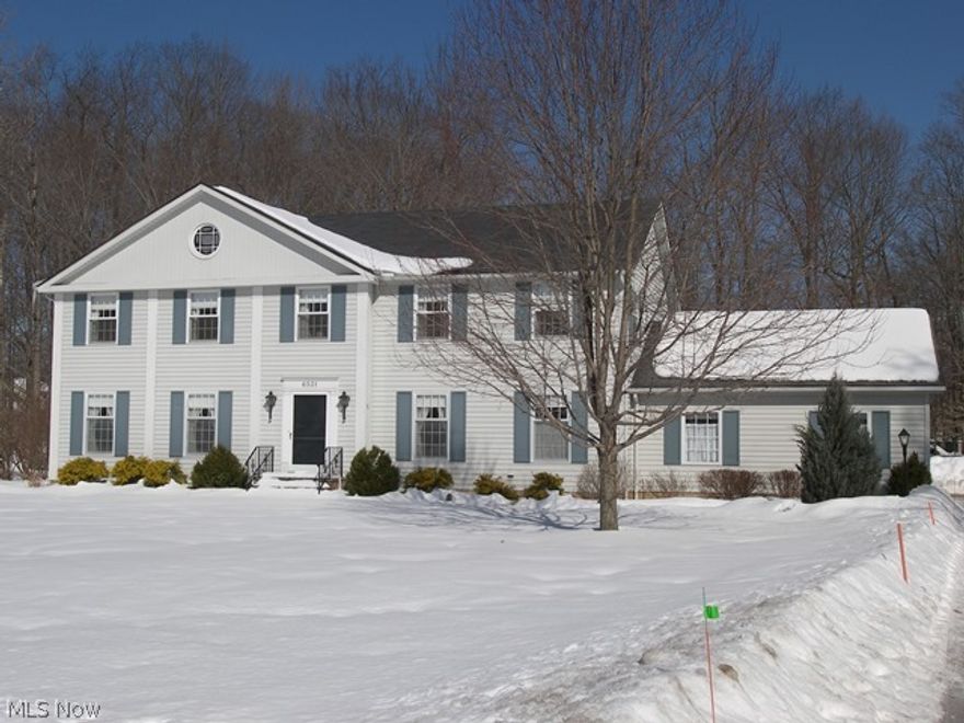 Welcome to this impeccably maintained traditional center hall colonial situated on a beautiful lot near the cul de sac.  As you enter the foyer with a slate floor, you walk in to the formal living room and dining room.  The spacious family room features a wood-burning fireplace with gas lighter and sliding doors to the three season sun porch and deck.  There is a U-shaped kitchen with appliances and a separate sun lit morning room to start your day.  All five large bedrooms and two full baths are on the second floor with the master suite having its own full bath.  The full basement has a partially finished recreation room and a large workshop area.  Other features include a half bath on the first floor and a first floor laundry.  There are wood floors under the carpeting on the second floor that have not been finished.  This is a great convenient location to the freeway, shopping, schools and the parks.  Furnace and a/c 2002.