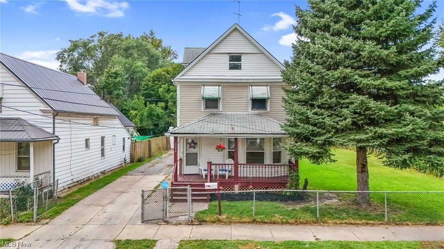 Excellent opportunity on this double lot, fully fenced in property. Home is a former 2 family, but was converted to single family. Upstairs kitchen connections are still in place. Downstairs you will find a large family room that leads into a large dining area. The kitchen had an addition at some point and offers extra space. 2 bedrooms and a bathroom/laundry room combo complete this floor. Upstairs are 2 more bedrooms, a living room and full bath. The attic and basement could be bonus space. Additional parcel to covey with sale, parcel is zoned R5000. Bring your ideas and turn this into an excellent investment property. Surveillance cameras are active. Cash sale only.