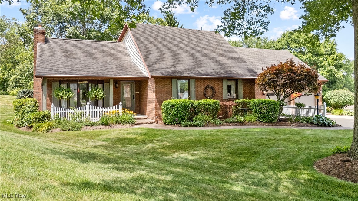 Soaring ceilings and first floor living are just a couple notable features in this contemporary brick home in Canton South's best kept secret; Terrace Manor. As soon as you walk in you know you're in for something special. The living room to the left boasts beamed cathedral ceilings, a bay window, sliding doors to the backyard, and a stunning brick fireplace that makes for a the perfect focal point. The dining room continues the theme of natural light with large windows filling the room. An eat in kitchen adds extra seating and usability to an already well updated kitchen that features stainless appliances, Corian counters, and vinyl plank flooring through most of the first floor. The spacious master bedroom offers loads of closet space and direct access to the updated bathroom featuring a gorgeous tiled walk in shower and a double vanity. Rounding out the first floor is the laundry room with built in storage and direct access to the two car garage. Upstairs you'll find two well sized guest rooms, a full bath, and an oversized storage nook with easy access. The basement offers even more space and could easily be finished off with a rec-room and bath thanks to being plumbed for another bath. Recent renovations have allowed the home to retain a classic look as well as some updated mechanicals. The hot water tank and furnace/AC were replaced in 2015, while the flooring, paint and bath were done in 2018. More recently the home saw a new deck in 2022 that allows for enjoyment of the secluded back yard. Don't miss your chance to call this place your own, schedule your showing today!