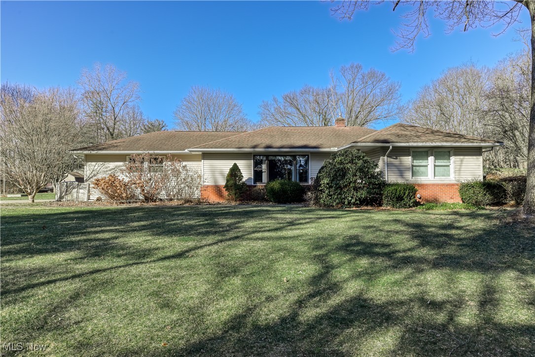 PRICED TO SELL!!! This well-maintained ranch home features 2 spacious bedrooms and 2.5 baths. The beautifully remodeled half bath on the main floor was originally designed as a third bedroom and can easily be converted back to suit your needs. The open-concept kitchen and dining room create a welcoming space for entertaining, while the large living room showcases beautiful hardwood floors. The full basement offers additional living space, office space, and plenty of additional storage. Enjoy outdoor relaxation on the peaceful deck just off the living room, and benefit from the convenience of a 2-car attached garage. Located in the desirable Green City School District, this home offers comfort, accessibility, and a fantastic layout - perfect for modern living. The property also includes a shed and riding mower, both staying with the home. Schedule your showing today!