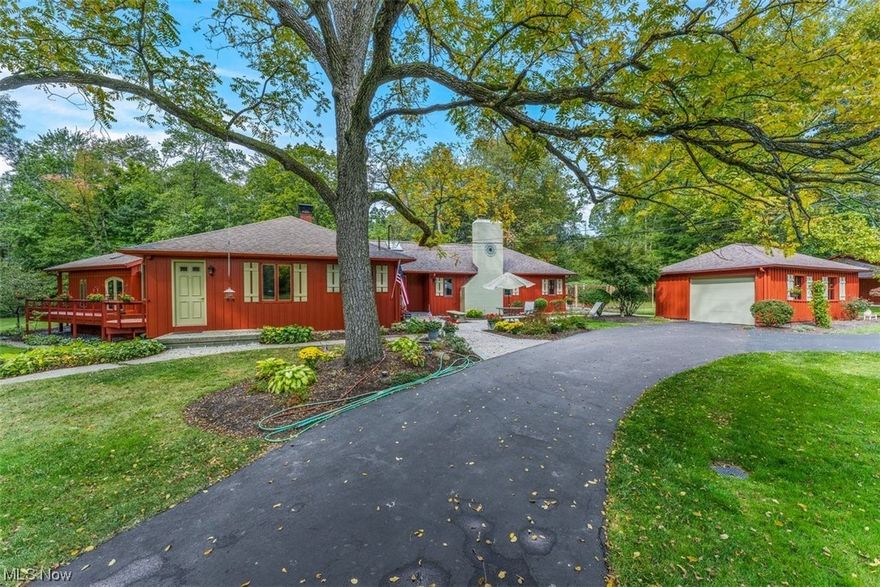 Welcome to your dream home nestled on over 11 acres of pure privacy & seclusion. The Beautiful 2600+ sq ft Ranch boasts 4 Bedrooms, 3 1/2 baths, easy one-floor living & a partially finished walk-out lower level. As you approach, you'll be greeted by a grand circular driveway, providing convenient access to your new haven of tranquility. The spectacular views paint a serene backdrop for your everyday life. Step inside, & you'll discover a home designed for both comfort & entertaining. Large Windows & Skylights allow Natural light to pour in, illuminating the warm & inviting interior. The Kitchen is equipped w/SS appliances & ample Cabinets & counter space. The Owner’s Ensuite will take your breath away, complete w/access to a sprawling wrap-around deck. Imagine starting your mornings w/ a cup of coffee taking in the peaceful surroundings & watching the deer & other wildlife. For those with a passion for cars or hobbies, a 1 1/2 car garage, a 3-car carriage house & a versatile barn provide ample space for all belongings. This retreat backs up to the stunning Girard Lake, providing easy access to fishing or watching the Eagles soar. To complete the natural beauty of this remarkable 11+acre estate, a tranquil creek winds its way through the property, adding to the overall ambiance of this private retreat. All this & FREE GAS! Schedule your private tour today to experience the ultimate in peaceful living & begin a new chapter in your life surrounded by unparalleled natural beauty.