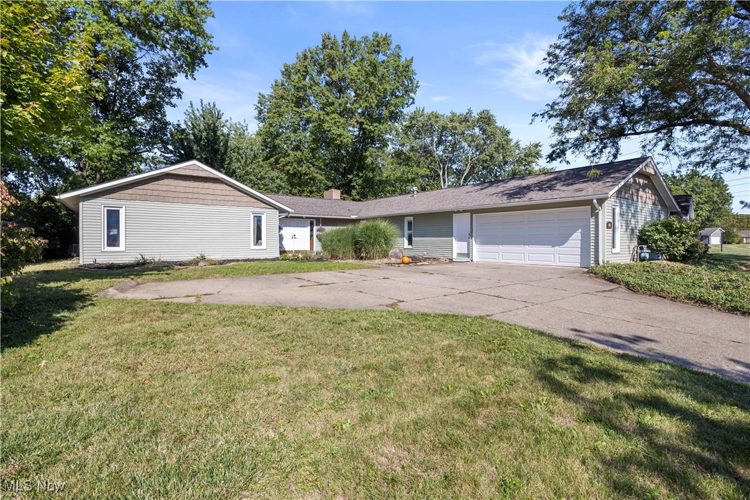 Welcome to this sprawling ranch home in Longbrooke, offering 4 bedrooms, 2.5 baths, and with 3 distinct living areas. Upon entering through the double doors, you are greeted by a spacious foyer with two coat closets, leading into the formal living room. The family room features a gas fireplace, neutral tones, and abundant natural light. The kitchen is open to both the dining and family rooms. Additionally, a large office or recreation room, conveniently located near the kitchen, provides another ideal area for entertaining or whatever your needs are. The home boasts a split floor plan, with the bedrooms situated on one side and the living areas on the other, ensuring peaceful nights for all residents. The owner's suite includes a remodeled bathroom (2018), a walk-in closet, and private access to a hot tub and pergola. Numerous Recent improvements: New furnace, A/C, and hot water tank: living side (November 2014) bedroom side (May 2017) Complete roof tear-off (July 2017) New gutters (2019) New vinyl siding (2020) Hot tub and pergola (2020) and more!! Further features include an oversized two-car attached garage! This home is just minutes from downtown Berea, Coe Lake, the Metroparks, and Baldwin Wallace University. It also offers easy access to I-71, I-480, I-80, and Cleveland Hopkins International Airport. Schedule your private viewing today!