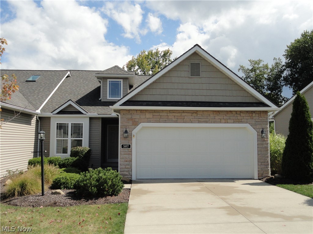 Impressive Ranch condo situated in the Villas of Waterford Crossings, a newer desirable Tallmadge community with convenient location to the highways. Attractive curb appeal, end unit , on a cul de sac with a semi private backyard and a deck overlooking a lovely green space. Foyer entry, attractive open floor plan with a cathedral ceiling that encompasses the great room with gas fireplace, the dining room with a bay window and the kitchen with breakfast bar. Plus there is a sunny sun room addition which opens to the deck porch and overlooks the backyard. Guest suite and 1st floor laundry is separate from the master suite which includes an oversized walk in closet,and a master bathroom with easy step in shower. The spacious basement is ideal for finishing with standard sized windows welcoming the sunlight and plumbing for a bathroom. Very well maintained! Call today.....