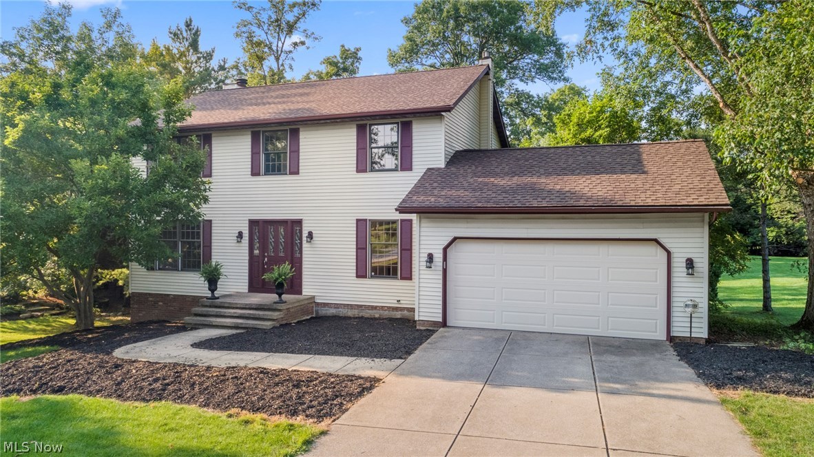 Situated on an acre of beautiful land in a quiet cul-de-sac, this colonial will take your breath away. Step inside the updated main level and get settled in the living room, or continue through the formal dining room to the spacious new kitchen. Easy access to the laundry room and half bathroom. The family room provides a cozy backdrop for your escape from the daily grind. Upstairs, four bedrooms and a full bath allow room for your family to grow. The master suite is complete with its own full bathroom. The fully finished, walk-out basement offers amazing views of the deck and backyard while allowing room for a man cave or rec room. A bonus room creates space for a potential fifth bedroom. Host cookouts on the back deck or relax in the hot tub, all while the beautiful natural landscape surrounds you. Experience all the benefits of country living while staying close to the conveniences of the city! Close to all major roadways, great schools, shopping, and all the best Willoughby Hills h