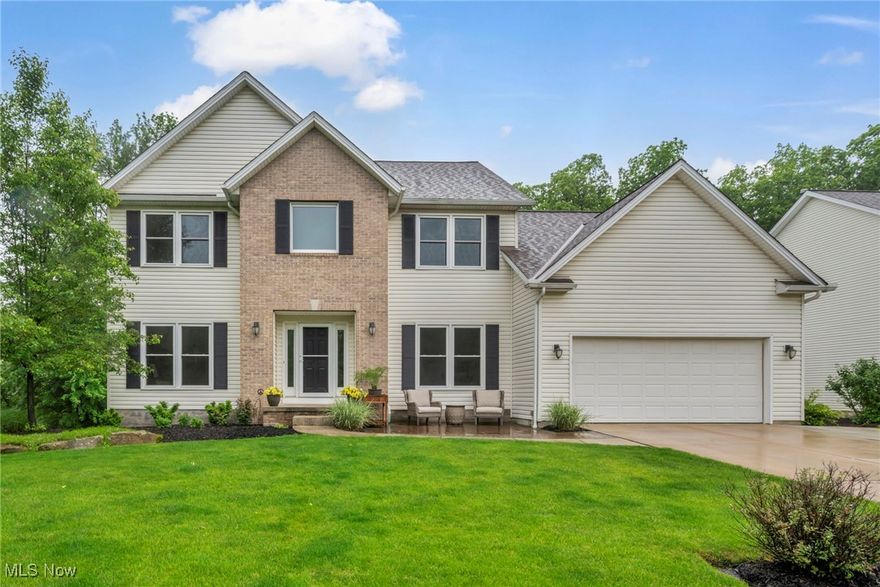 Welcome to 17360 Woodlawn Court a beautifully updated colonial located on a quiet cul-de-sac in the highly regarded Forest Glen community within The Preserve of Strongsville. This 4-bedroom, 3.5 bath home offers just over 4,000 sq ft of finished living space, including a fully finished walkout basement with a spacious recreation area, additional flex room, and ample storage. Major improvements include a new roof, gutters, gutter guards, windows, and doors (all completed in 2018), along with a Trex deck added in 2022, featuring generous storage underneath. Inside, the home has been freshly painted (2023) and features new luxury vinyl plank flooring, updated carpeting, and a modern staircase railing system with newel posts and spindles (2023). The kitchen, renovated in 2015, offers white shaker cabinetry, granite countertops, subway tile backsplash, and stainless steel appliances all included. The updated primary suite bathroom (2022) features a stylish walk-in tile shower. Other upgrades include a high-efficiency HVAC and A/C system (2015), hot water tank (2018), and an updated front patio (2023). Located in a well-maintained community with convenient access to shopping, dining, parks, and local amenities, this home offers a thoughtful blend of comfort, space, and quality upgrades. Schedule your private tour today and explore everything this property has to offer.