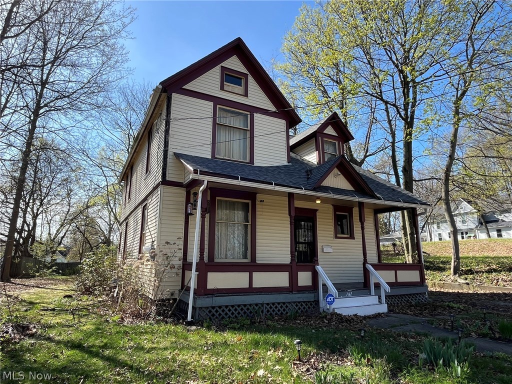 Investors special on this adorable, nearly 2,000 sq ft century home near Highland Square! The main level has an entrance foyer with original woodwork, formal living room with original decorative fireplace, kitchen, dining room, one bedroom with walk-in closet, and a full bath. Upstairs are three more large bedrooms, and a Jack and Jill full bath. There is an updated roof and vinyl siding. It is conveniently located on a quiet street near Downtown, Cascade Valley and Highland Square. This home needs updating and is being sold "As Is" by cash or conventional loans only. With some TLC this home could be restored to its original greatness!