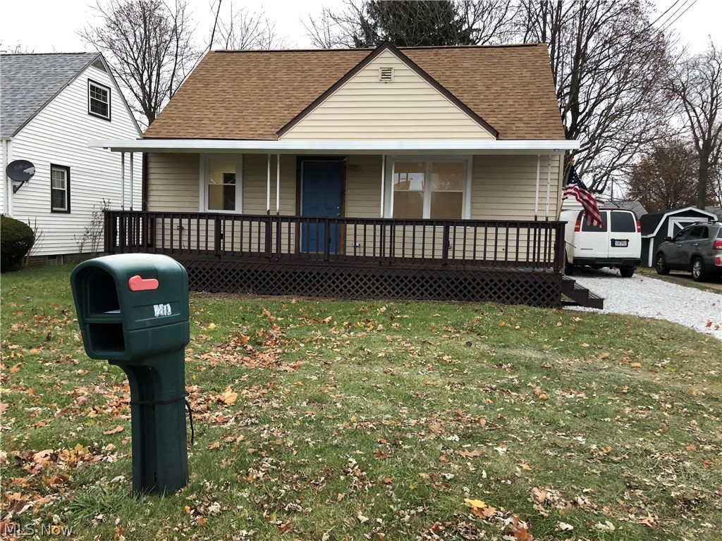 Total remodel! Bungalow with darling front porch, new white kitchen cabinets with quartz countertops, full bath remodeled, all new flooring, carpet, furnace. New roof, windows, plumbing, electric. Ready to move in! One car garage. Super location, easy to show.